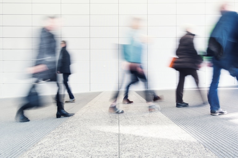 blurred people in a corridor